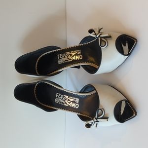 Salvatore Ferragamo white peep toe with metal accent and bow
